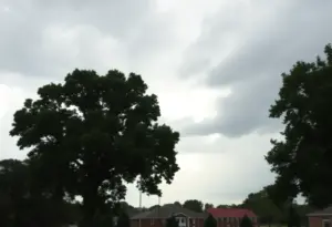 Cloudy skies over Aiken County with rain showers approaching.