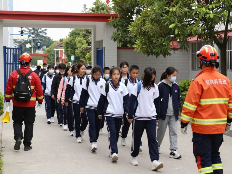 Students evacuating Cedar Ridge Elementary School due to foul odor.