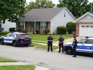 Law enforcement response during a standoff in a suburban neighborhood in Richmond County.