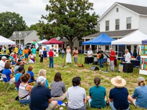A gathering of Aiken community members celebrating local talent and heritage.