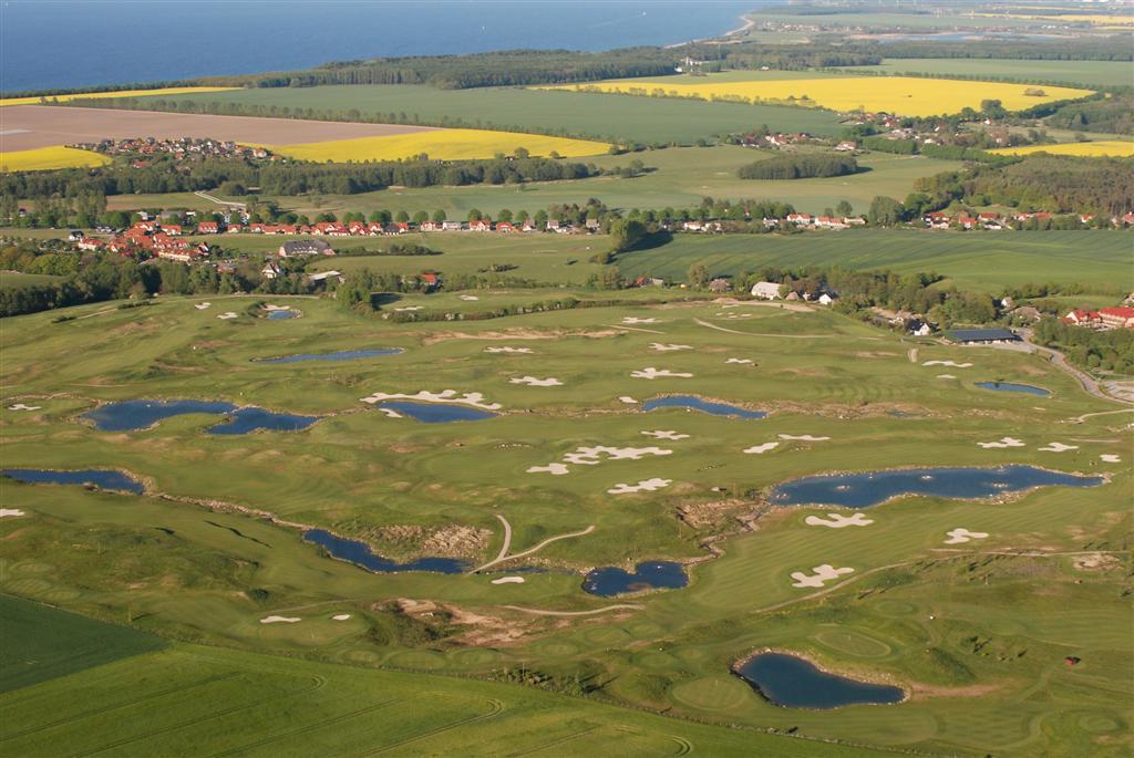Golf course fairway with trees