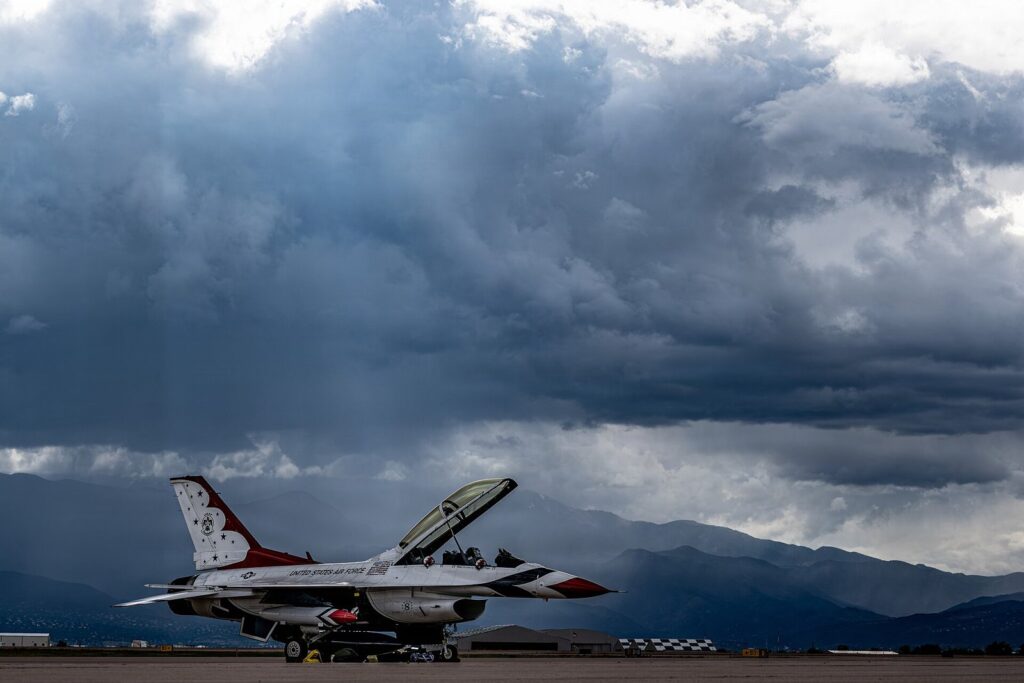 Air Force Thunderbirds jet under cloudy sky